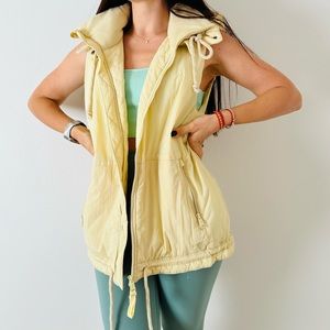 Free People care fp round & round recycled quilted puffer melon shell vest